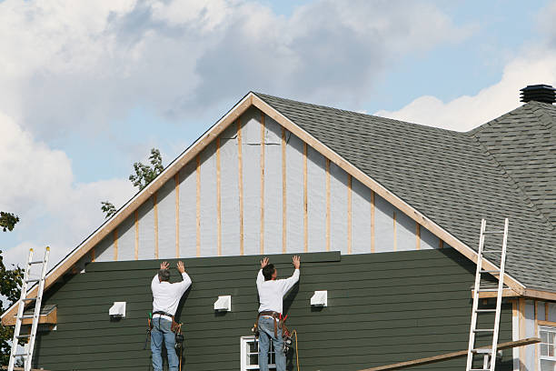 Professional Siding technician working in West Manchester, OH